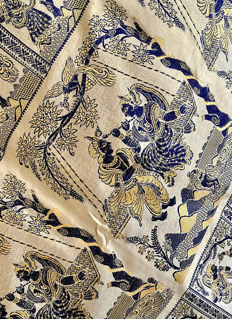 RITWIKA- ELEGANT BEIGE BALUCHARI SILK WITH RADHA-KRISHNA AND PEACOCK MOTIFS