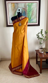 RAGAVI- GOLDEN YELLOW KORVAI KANJIVARAM WITH PEACOCK ZARI BORDER