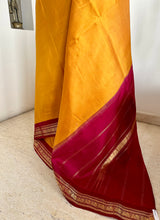 RAGAVI- GOLDEN YELLOW KORVAI KANJIVARAM WITH PEACOCK ZARI BORDER