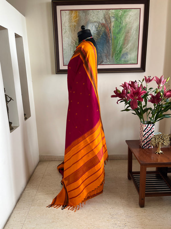 KRITISHA- VINTAGE KORVAI KANJIVARAM WITH PETNI AANCHAL IN MAROON AND MUSTARD HUES