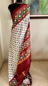 SRIVALLI- STRIKING WHITE POCHAMPALLY WITH BOLD IKAT MOTIFS