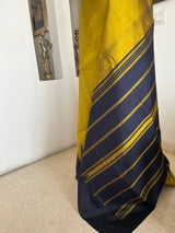 AATHIRAI – GREENISH GOLD KANJIVARAM WITH BLACK TEMPLE MOTIFS