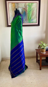 MADHUMAI – SEA GREEN KANJIVARAM WITH NAVY ZARI ELEGANCE
