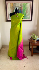 PARNAVI — LEAF GREEN KANJIVARAM WITH A STRIKING PINK AANCHAL