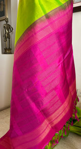 PARNAVI — LEAF GREEN KANJIVARAM WITH A STRIKING PINK AANCHAL