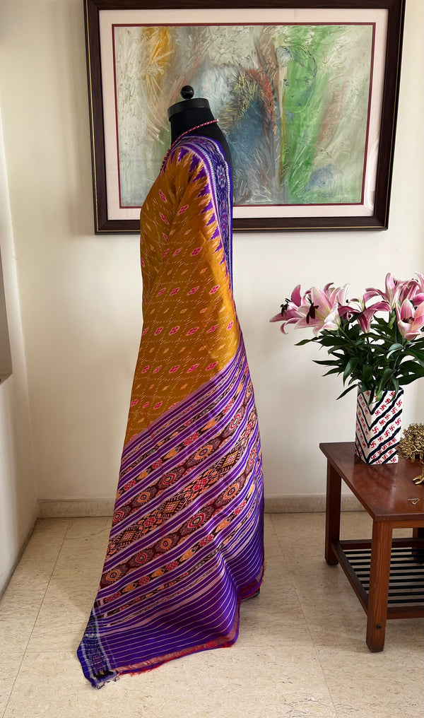 SUSHWETA- OCHRE KHANDUA SILK WITH BANDHA AND FLORAL MOTIFS