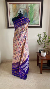RISHMIKA – SOFT CREAM POCHAMPALLY WITH CONTRAST BLUE ELEGANCE