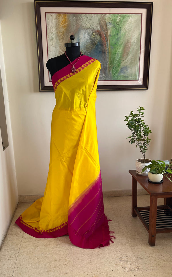 MINOLI – BRIGHT YELLOW KANJIVARAM WITH PINK TEMPLE BORDER