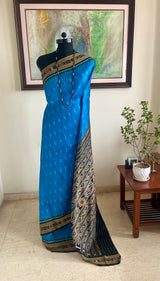 GARVITA – BLUE KHANDUA WITH PEACOCK FEATHER MOTIFS & BANDHA BORDER