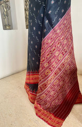 NIRUJA – STRIKING BLACK KHANDUA WITH CLASSIC RED BANDHA DETAILS