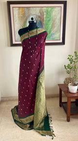 KOMATHI — DEEP MAROON KANJIVARAM WITH A DISTINCTIVE BORDER