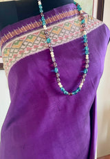 ABHISARIKA – PURPLE PUTAPAKKA IKAT SILK WITH DELICATE FLORAL DETAILING
