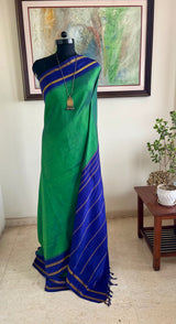ARYANA – SHOT SEA GREEN KANJIVARAM WITH NAVY CHEVRON BORDER