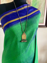 ARYANA – SHOT SEA GREEN KANJIVARAM WITH NAVY CHEVRON BORDER