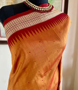 SNEHASMITA – BURNT ORANGE BOMKAI WITH A DISTINCTIVE GEOMETRIC AANCHAL