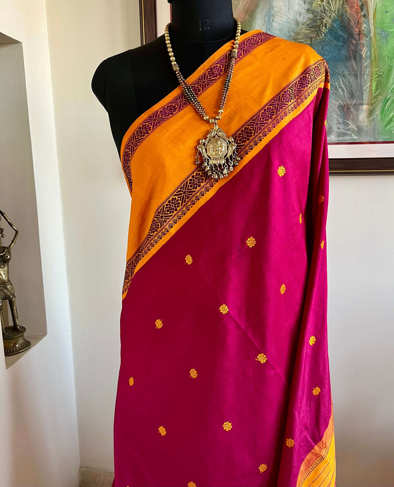 HASINI- MAGENTA KORVAI KANJIVARAM WITH ORANGE BORDER AND PETNI AANCHAL