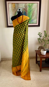 MEDHINI – MUSTARD TEMPLE BORDER ON GREEN CHECKED KANJIVARAM SILK
