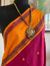 HASINI- MAGENTA KORVAI KANJIVARAM WITH ORANGE BORDER AND PETNI AANCHAL