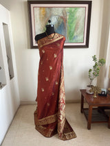 SAMBODHI- RUST BROWN SWARNACHARI SILK SAREE WITH MYTHOLOGICAL MOTIFS