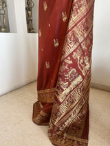 SAMBODHI- RUST BROWN SWARNACHARI SILK SAREE WITH MYTHOLOGICAL MOTIFS