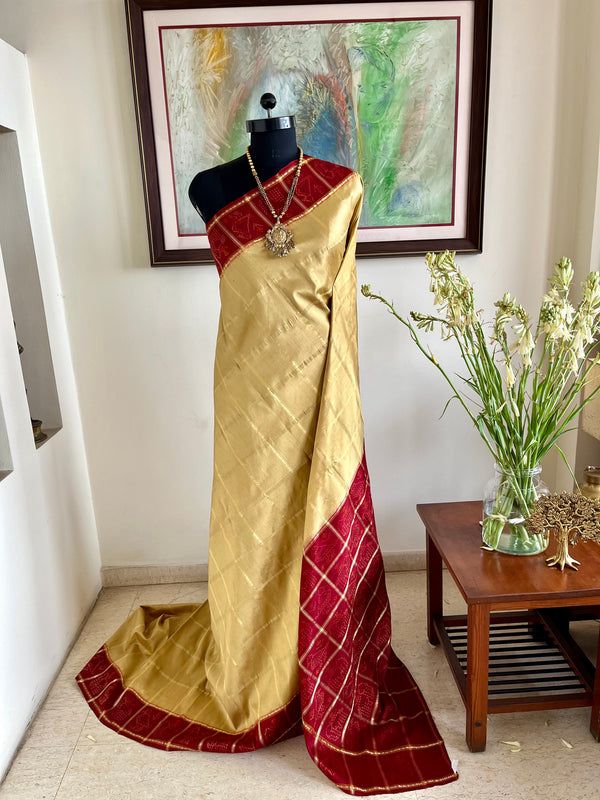 KRUTVI- WHITE AND GOLD GHARCHOLA SAREE WITH BANDHANI BORDERS