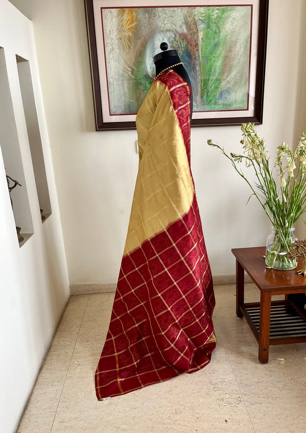 KRUTVI- WHITE AND GOLD GHARCHOLA SAREE WITH BANDHANI BORDERS