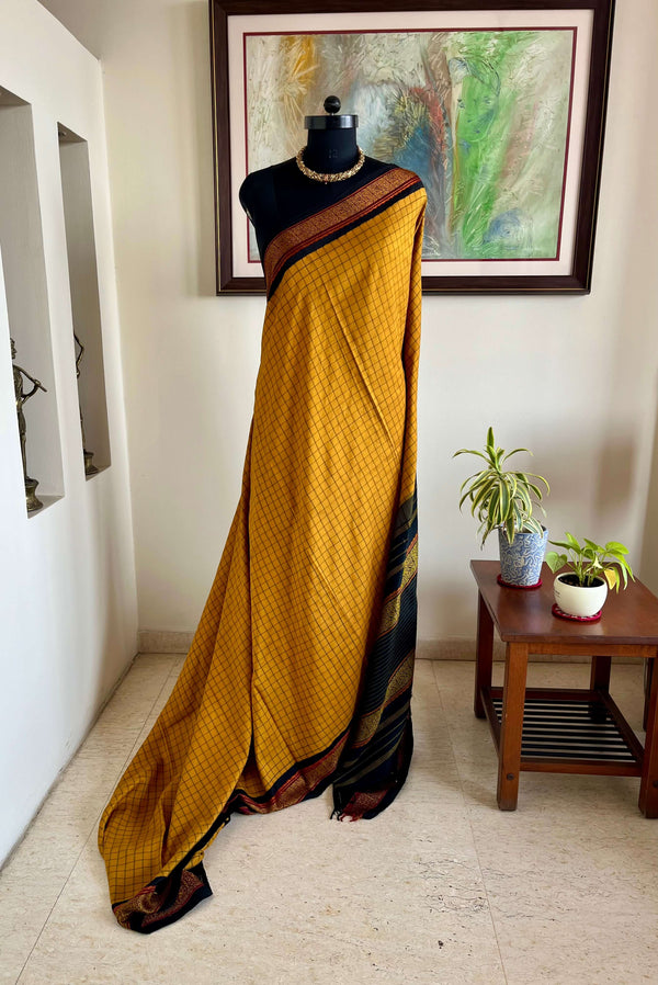 TUSHITA- VINTAGE MUSTARD KORVAI KANJIVARAM WITH CHECKS AND PETNI BORDER