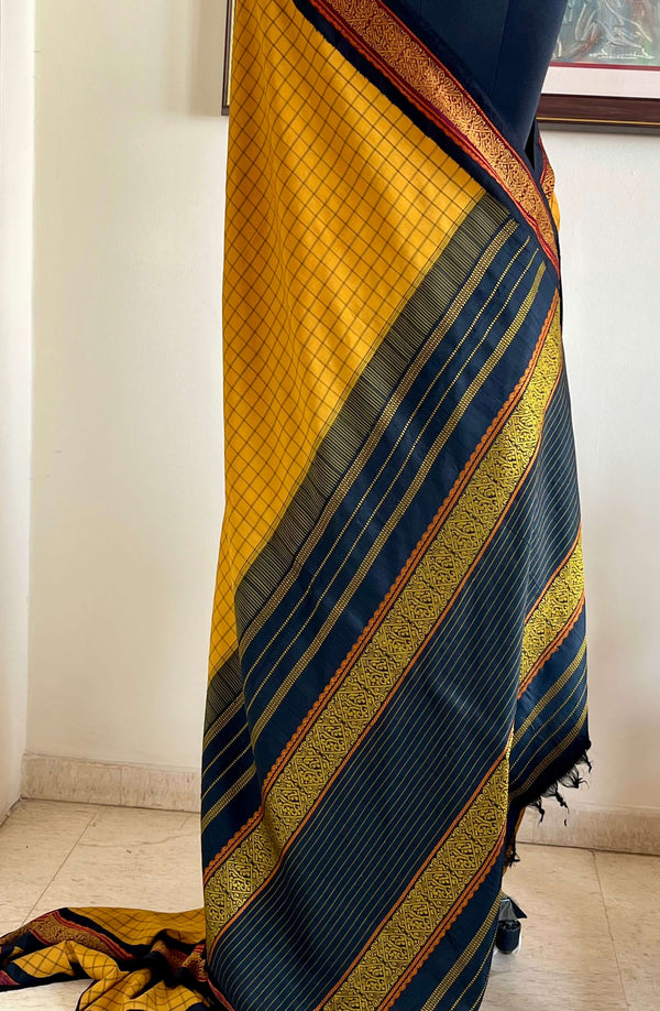 TUSHITA- VINTAGE MUSTARD KORVAI KANJIVARAM WITH CHECKS AND PETNI BORDER