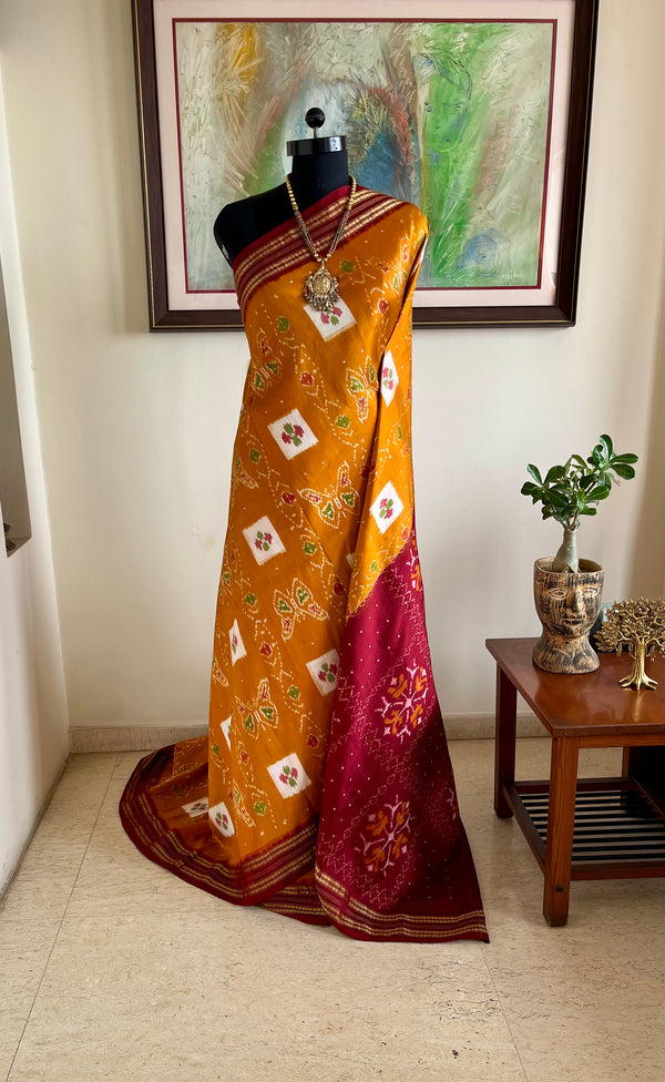 IRAVI- MUSTARD POCHAMPALLY IKAT SAREE WITH FLORAL AND BUTTERFLY MOTIFS
