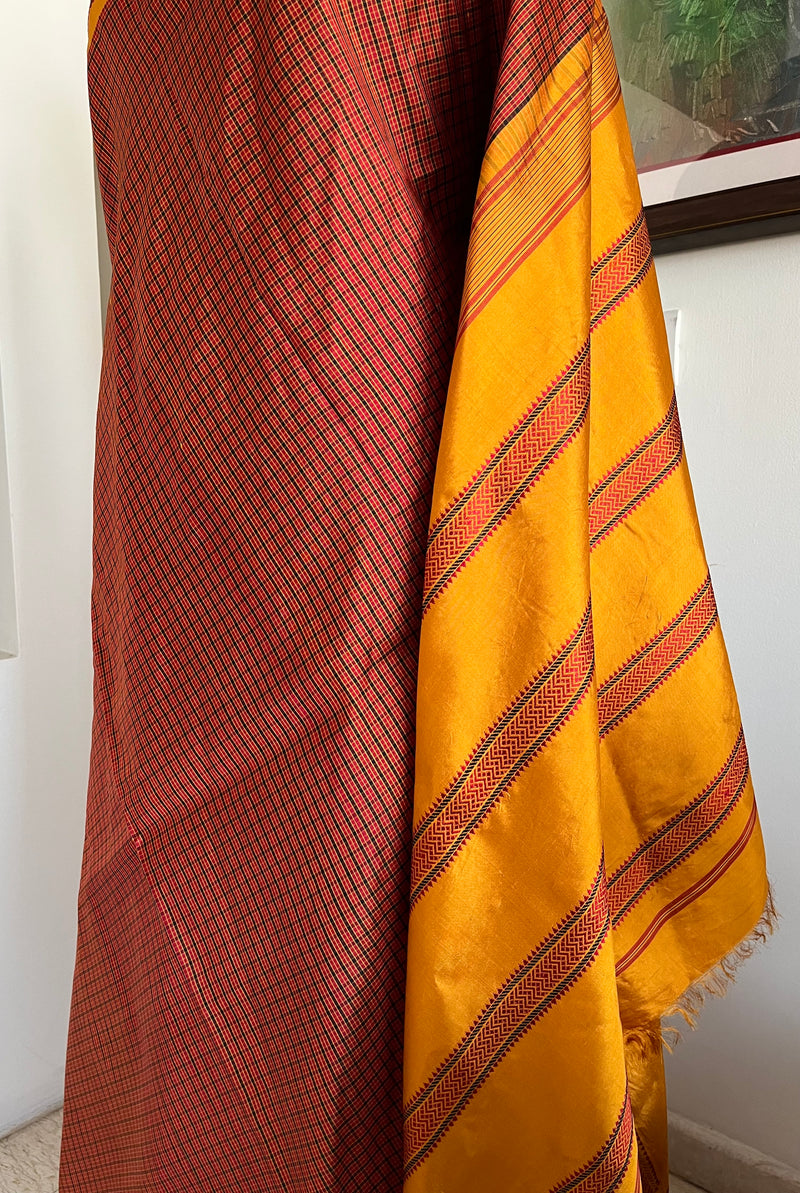 TAMIRA- KATTAM KANJIVARAM WITH RUST-BROWN CHECKS AND PINKISH RUST BORDER MOTIFS