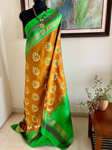 SAHELI- ELEGANT BROWN PATOLA IKKAT SAREE WITH ZARI BORDER & UNIQUE MOTIFS