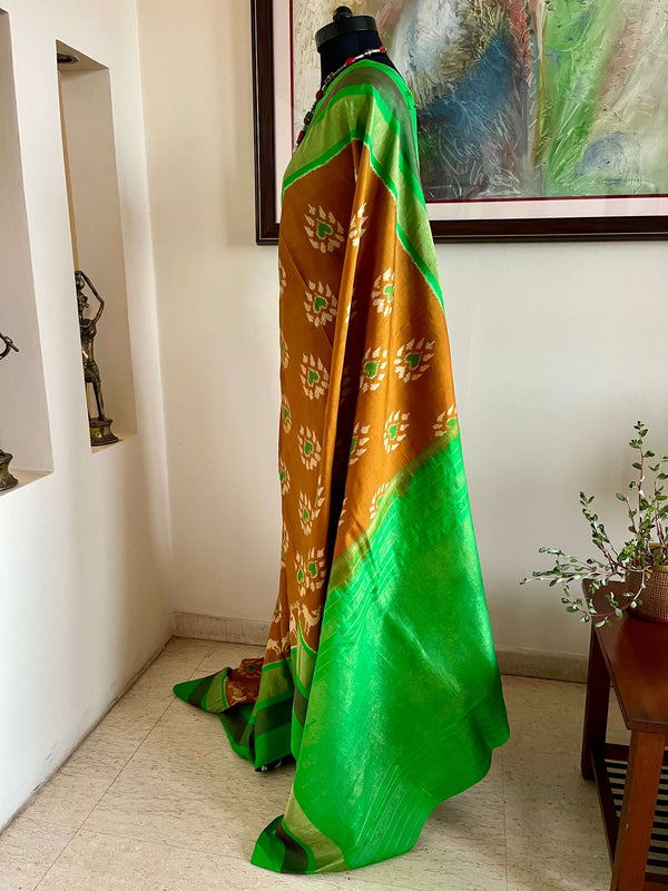 SAHELI- ELEGANT BROWN PATOLA IKKAT SAREE WITH ZARI BORDER & UNIQUE MOTIFS