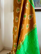 SAHELI- ELEGANT BROWN PATOLA IKKAT SAREE WITH ZARI BORDER & UNIQUE MOTIFS