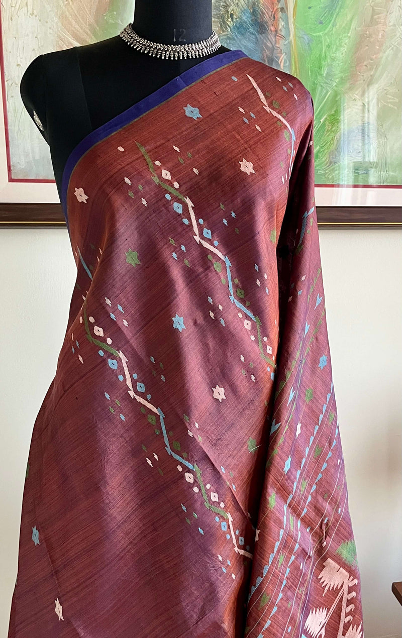 CHAITASI- WINE MAROON TUSSAR JAMDANI SAREE WITH BLUE, PEACH & GREEN MOTIFS