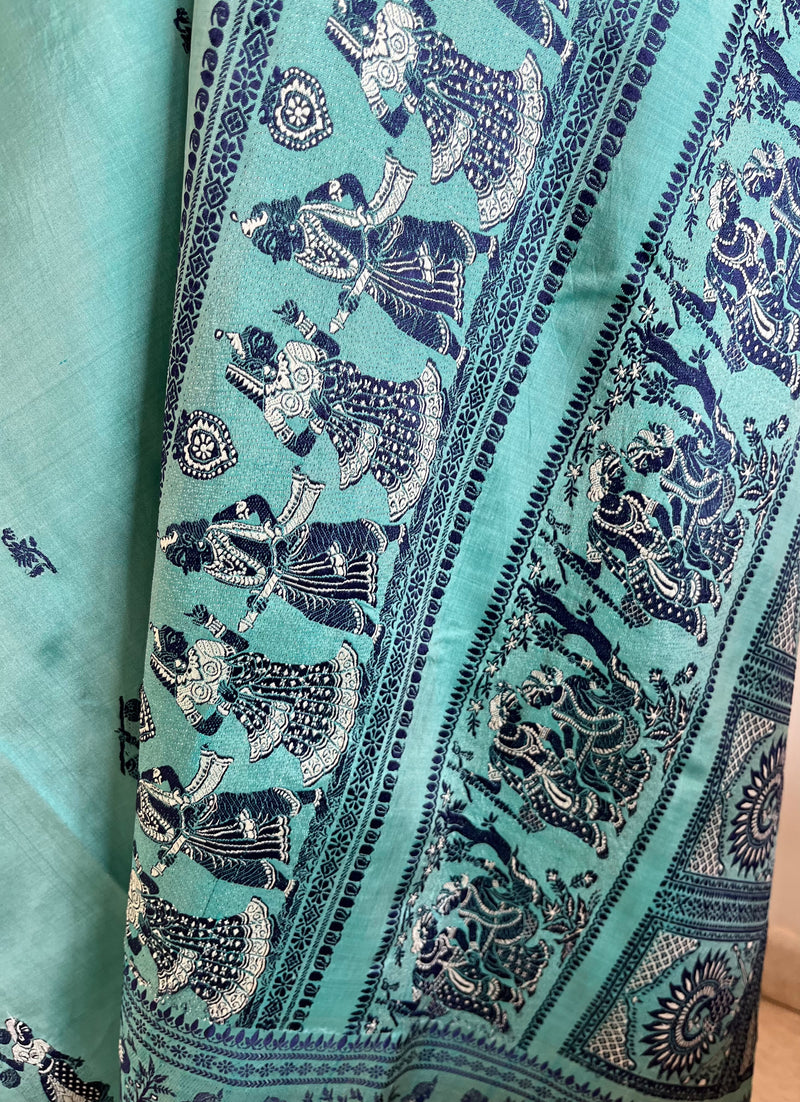 TUMPA- PASTEL BLUE BALUCHARI SAREE WITH KRISHNA’S RAAS LEELA & IKTARA MOTIFS