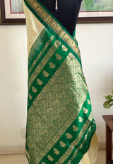 AARUTHIRA- ELEGANT CREAM KANJIVARAM SAREE WITH GREEN ZARI PEACOCK BORDER & BOOTIS