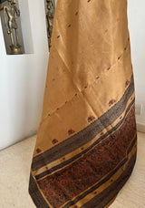 PRIYATHA – DARK BEIGE ASSAM SILK WITH BLACK RED AANCHAL