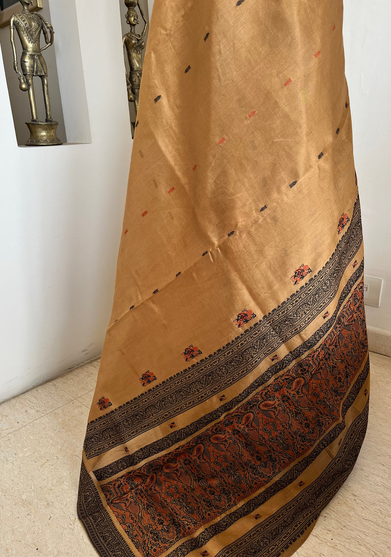 PRIYATHA – DARK BEIGE ASSAM SILK WITH BLACK RED AANCHAL