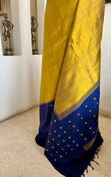 SURAANGI – MUSTARD GOLD KANJIVARAM WITH NAVY BOOTI BORDER