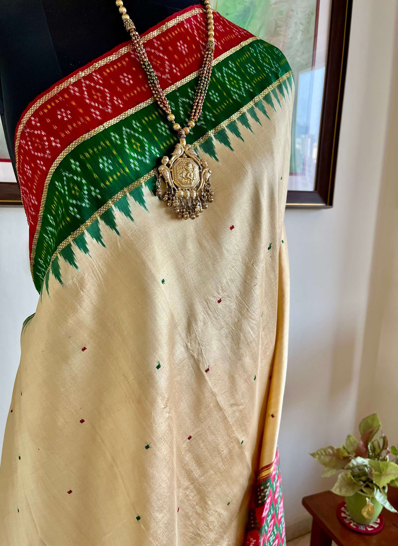 ASHMITHA- EXQUISITE CREAM PATOLA WITH MAROON-GREEN ACCENTS