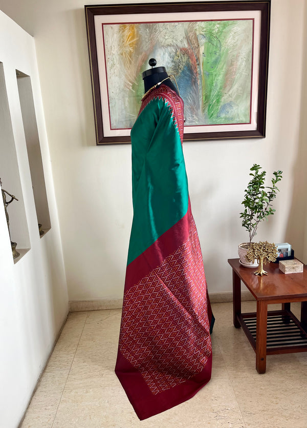 NAVYAANI- TEAL POCHAMPALLY SILK WITH TRIANGLES AND TEMPLE BORDER
