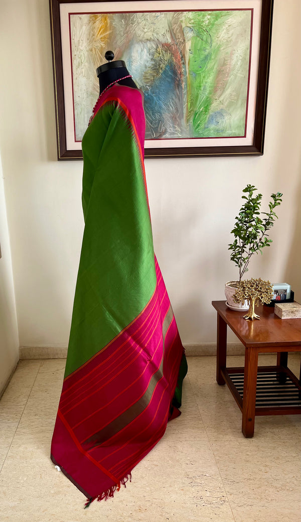 VAANATHI – GREEN KANJIVARAM WITH MAROON AND ORANGE DETAIL
