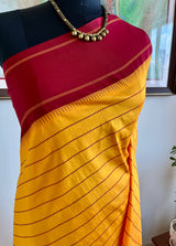 KANTHI- KORVAI VELDHARI KANJIVARAM IN YELLOW AND MAROON ELEGANCE