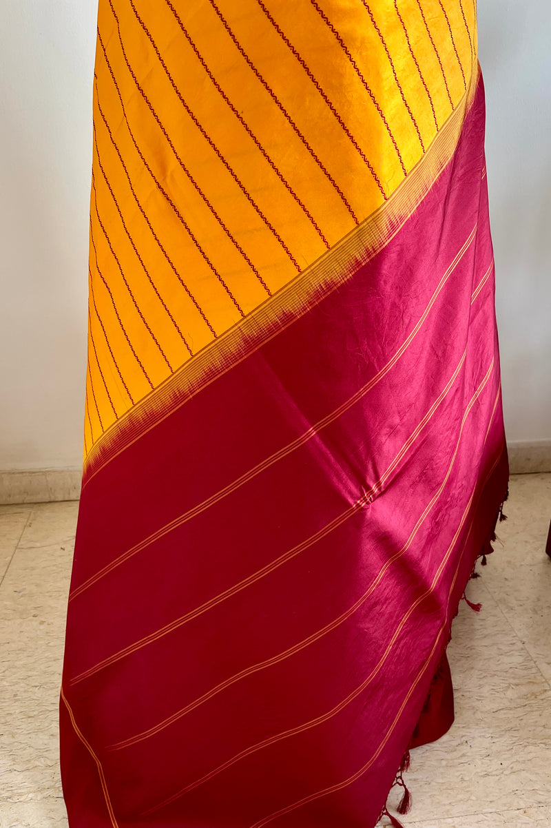 KANTHI- KORVAI VELDHARI KANJIVARAM IN YELLOW AND MAROON ELEGANCE