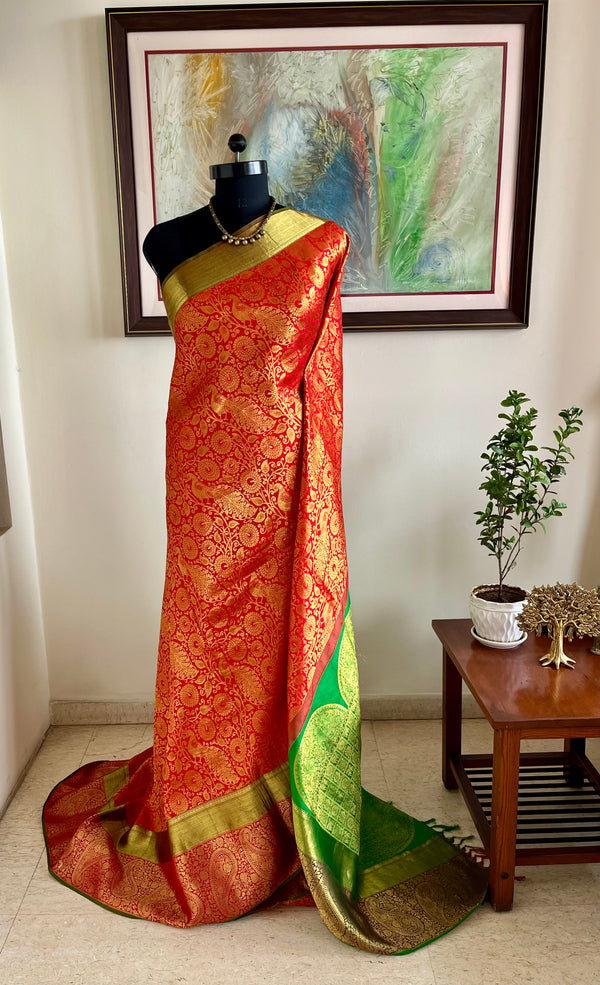 RAJINI – ORANGE KANJIVARAM WITH TRADITIONAL ZARI WOVEN MOTIFS