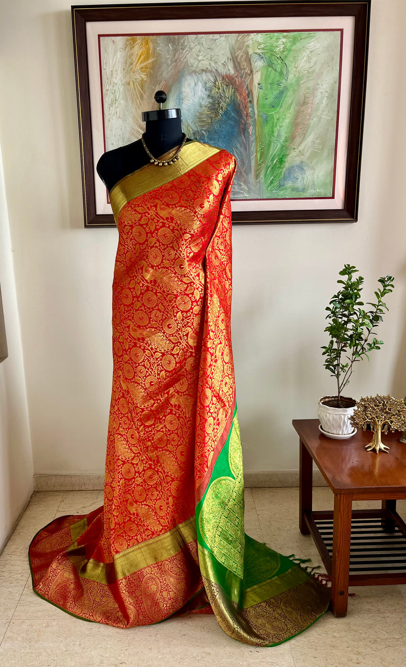 RAJINI – ORANGE KANJIVARAM WITH TRADITIONAL ZARI WOVEN MOTIFS