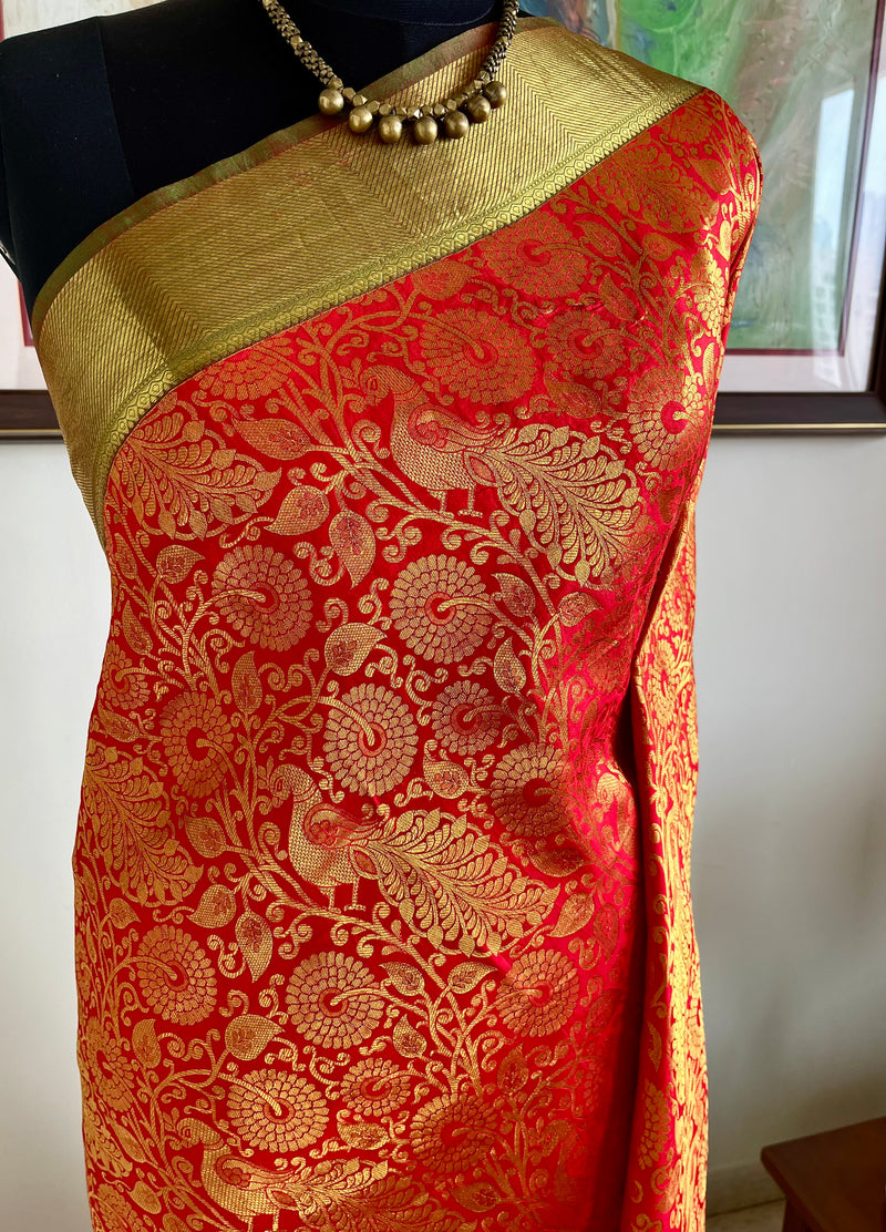 RAJINI – ORANGE KANJIVARAM WITH TRADITIONAL ZARI WOVEN MOTIFS