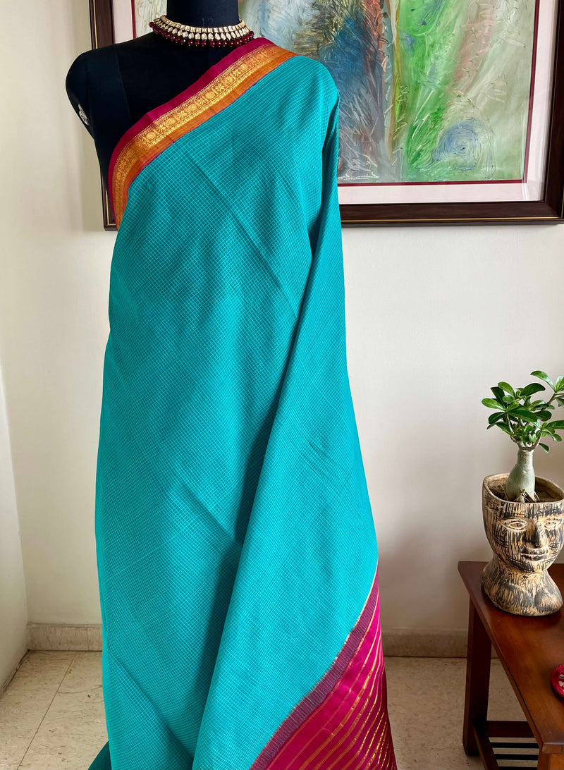 VRITIKA - SUBTLE BLUE GADWAL COTTON SAREE WITH RED ZARI BORDER