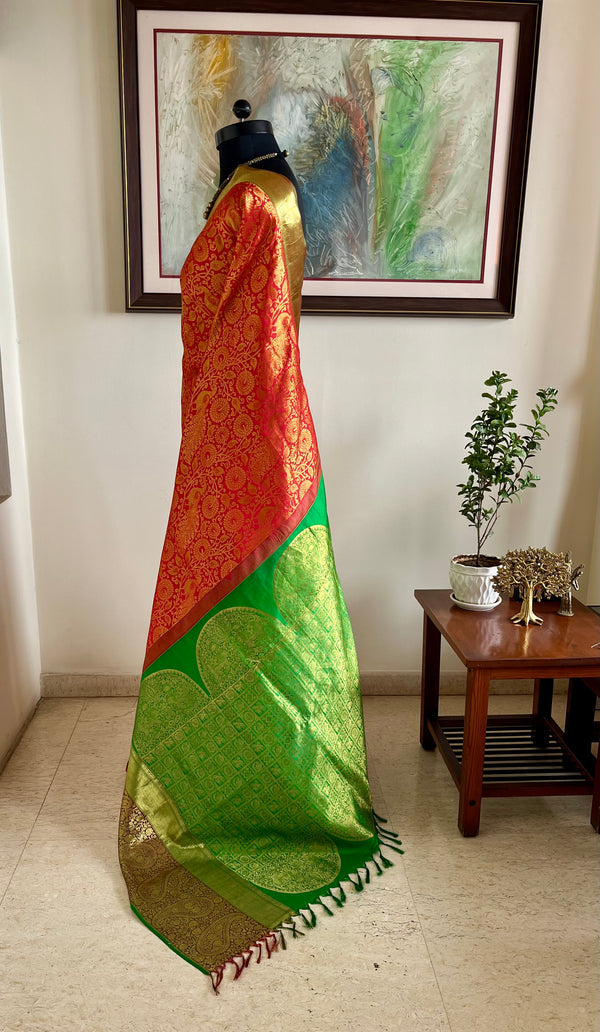 RAJINI – ORANGE KANJIVARAM WITH TRADITIONAL ZARI WOVEN MOTIFS