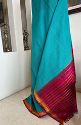 VRITIKA - SUBTLE BLUE GADWAL COTTON SAREE WITH RED ZARI BORDER